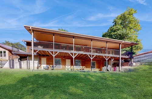 Hoyt House | Gorgeous Lakefront Home, private dock and short walk to beach