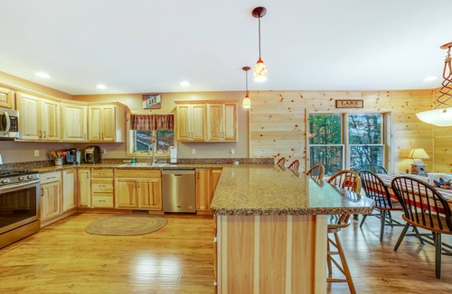 Chestertown House | Gorgeous Lakefront Home with a Fire Pit, Two Living Areas, and a Sunroom