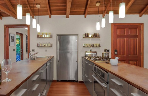 Hacienda Cottage | Gorgeous lush private RIVERFRONT modern cabin