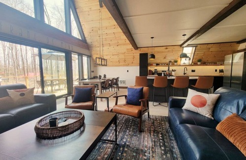Bellaire Apartment | Gorgeous New A-Frame w/Sauna & Gameroom - Minutes to Pools, Golf and Skiing
