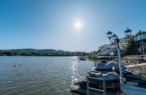 Oxenford House | Gorgeous Riverfront 5BR House with Pool