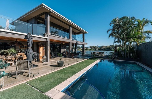 Oxenford House | Gorgeous Riverfront 5BR House with Pool