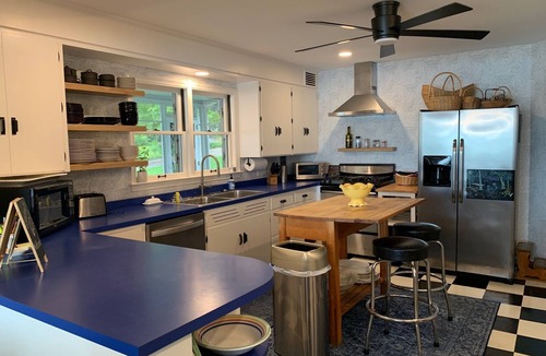 Paw Paw Lake House | Gorgeous Sandy Beachfront Paw Paw lake home with 155 ft. of frontage and dock