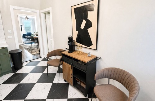 Lakeview Apartment | Gothic-meets-mid-century 2BR in Lakeview | Statment Kitchen + Dining for 4