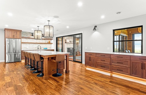 Alexandria House | Grand Lake Miltona Home Level Lakeshore 5000sqft 6BR Sleeps 16 12-Person Hot Tub