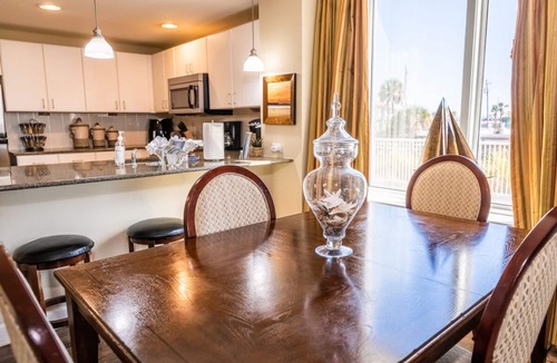 Panama City Beach Condo | GRAND PANAMA BEACHFRONT, 1st FLR DIRECT TO BEACH, PET-FRIENDLY. NEXT TO TIKI BAR