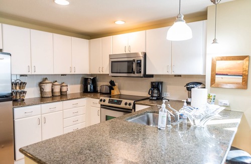 Panama City Beach Condo | GRAND PANAMA BEACHFRONT, 1st FLR DIRECT TO BEACH, PET-FRIENDLY. NEXT TO TIKI BAR