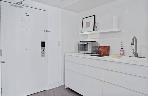 West Avenue Apartment | Grand Suite with Private Balcony, Pool, and Gym
