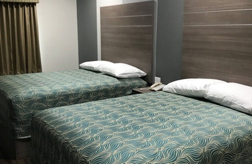 Humble Hotel | Grand Villa Inn & Suites - Humble