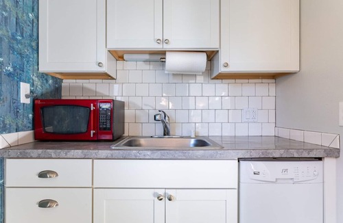 Washington Park Apartment | Grandmillennial-Style | UW Cap Hill | EV Charging