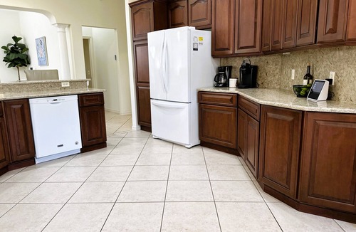 Santiago House | Great location.Climate-controlled lanai & NEW 2024 4-SEATER GOLF CART INCLUDED!