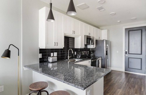 McNeil Apartment | Great Lost Plains 1BR w/Parking, Gym, Pool & W/D, by Blueground
