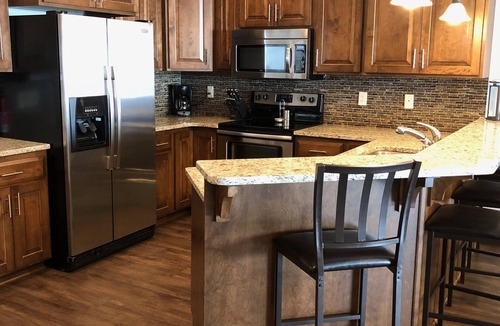 Spirit Lake Condo | Great views! Third floor end unit - Indoor parking!