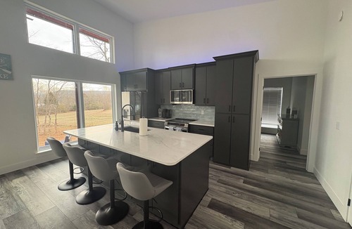 Clinton House | Greers Ferry Waterfront new construction home minutes from Furgersons Marina.