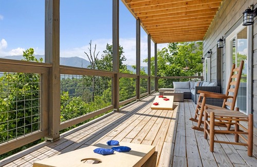 Chalet Village North Cabin | Grizzlies Den 4 Bedroom Cabin by RedAwning