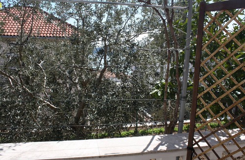 Seget Donji House | Ground floor double room with approx. 25m² air conditioning, terrace, sea view