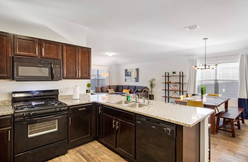 Austin House | Ground-floor home with foosball table, washer/dryer, AC, enclosed patio & WiFi