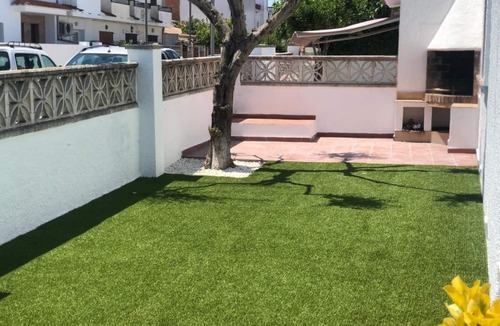 L'Escala Villa | Ground floor house with garden and community pool