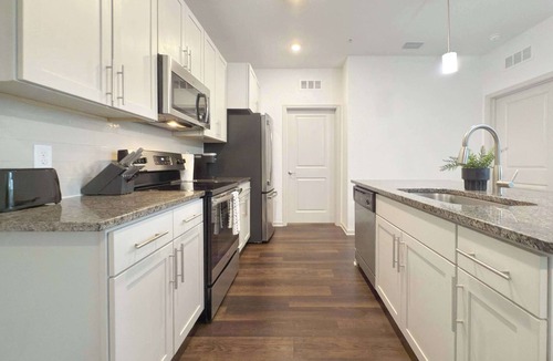 Clearwater Apartment | Ground-Floor Luxury 2 BR with Pond and Pool Views