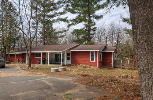 Waupaca House | Group Friendly! Riverfront Waupaca Retreat with Yard