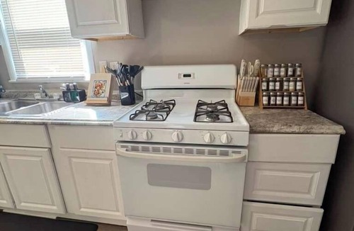 Kansas City House | Group Getaway Sleeps 7 Grill Fire Pit