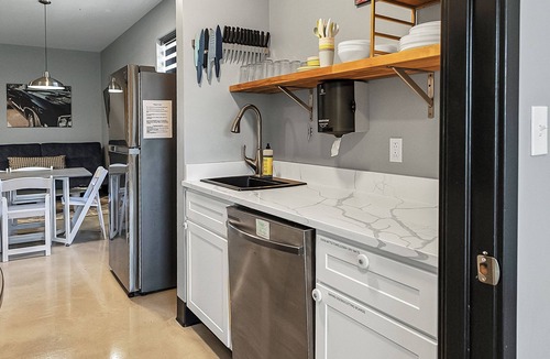 Pacific Hotel | Group suite with full kitchen and laundry on the second floor of The Landing Hub Hotel
