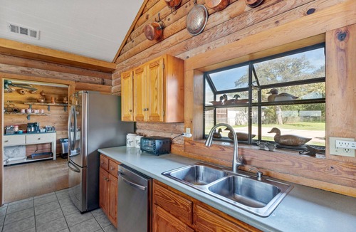 Kerrville House | Guadalupe Bluff Log Cabin - Hot tub - Guadalupe River View