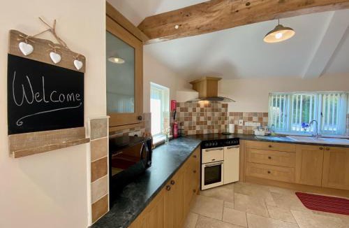 Ottery St Mary House | Guernsey Cottage