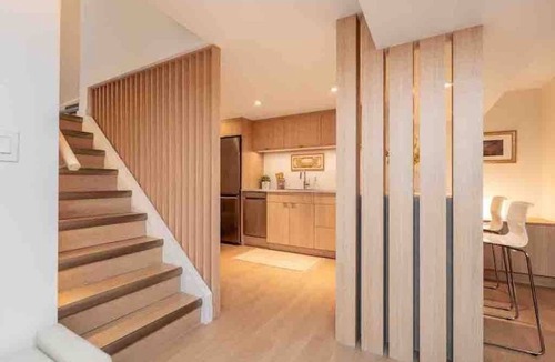 Winnipeg House | Guest suite in The Gates - Lower level luxury with sauna, workspace & fireplace