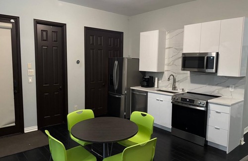Spring House | Guesthouse with Lakeview in The Woodlands: Pool, BBQ, Firepit, Bike, Paddle Boat