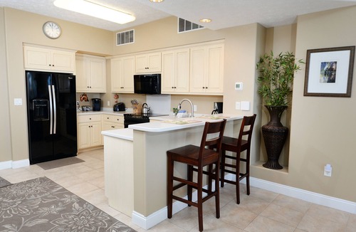 Thomas Drive Condo | Gulf Crest -Walk In Shower in Master