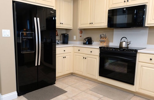 Thomas Drive Condo | Gulf Crest -Walk In Shower in Master