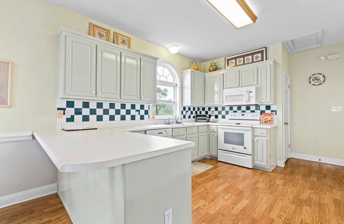 Audubon Place House | Gulf-Front Community Duplex across from the beach