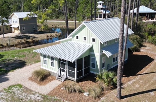 Carrabelle House | Gulf Views From Front Porch! Pet-Friendly Cottage with Kayaks & Community Pool