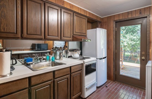 Boyne Falls House | Gus`s Stump, a scenic retreat by all of the winter and summer fun of Michigan.