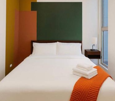Near West Side Apartment | Gym Garage Parking Balcony Sleeps 4