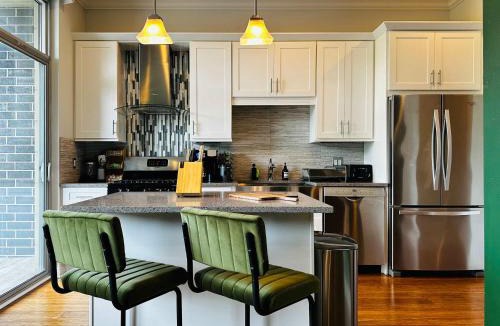 Near West Side Apartment | Gym Garage Parking Balcony Sleeps 4