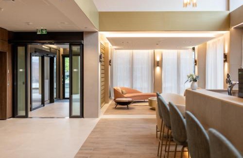 Marly Hotel | Hôtel des Innovations - Hôtel & Appartements - Votre séjour entre Fribourg, ville médiévale et La Gruyère et ses Bains