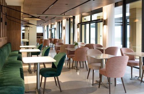 Marly Hotel | Hôtel des Innovations - Hôtel & Appartements - Votre séjour entre Fribourg, ville médiévale et La Gruyère et ses Bains