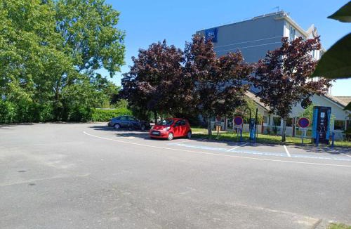 Coueron Hotel | Hôtel Ibis Budget Nantes Ouest Atlantis Couëron