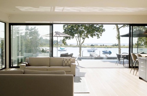 Noyack House | Hamptons Luxury Waterfront with Pool Dock and Sunsets