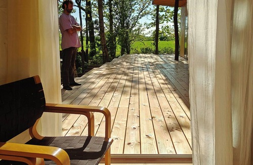 Nakskov House | Handbuilt cottage in untouched forest by Langø
