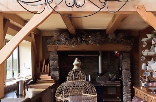 Richmond Downs House | Handhewn Barn in a field