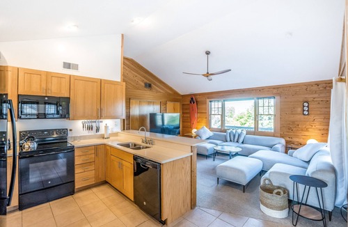 Palisade Acres House | Handsome raised home with private hot tub, & central AC