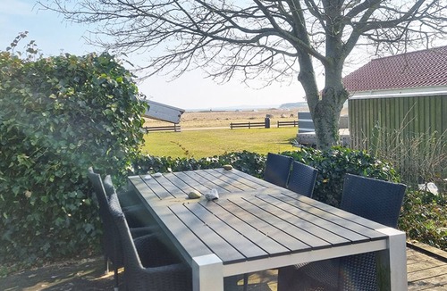 Diernæs Strandby House | Harmoniously renovated vacation home near the beach with a view of the water