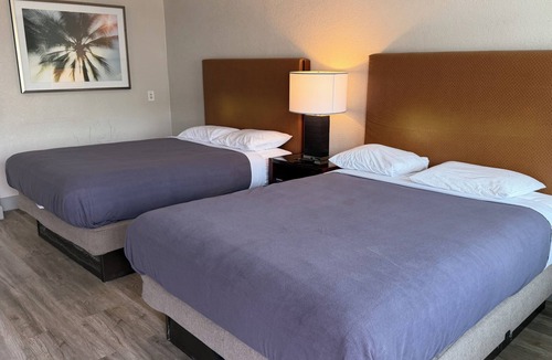 Beaumont Hotel | Harmony Inn and Suites