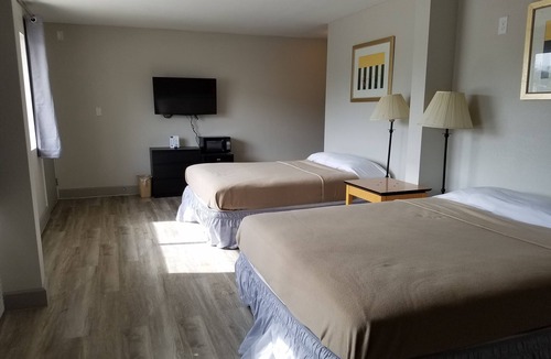 Beaumont Hotel | Harmony Inn and Suites