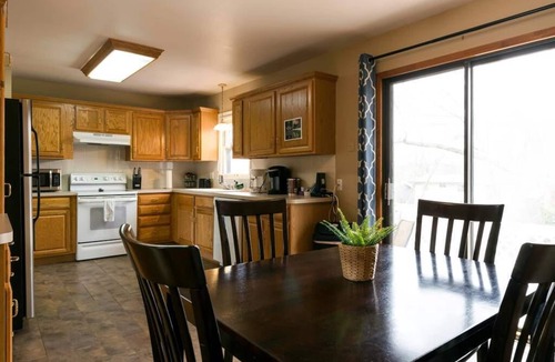 South Kansas City House | Hartley's Yellow House of Joy
