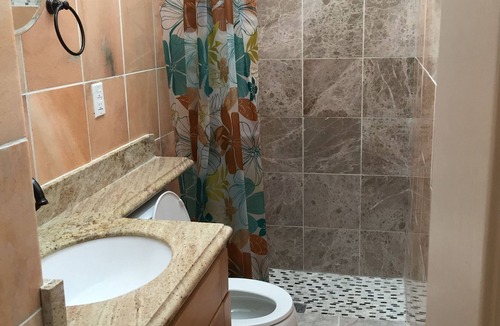 Sunnyside Apartment | Has a huge deck, BBQ,Table,Chairs