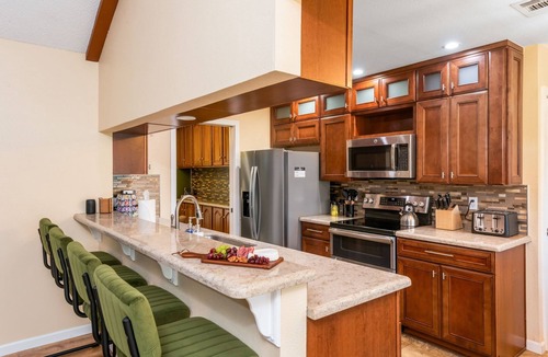 Blossoms Park House | Have Fun, Relax -Heated Pool, Hot Tub, Game Room, Fire Pit & Gym
